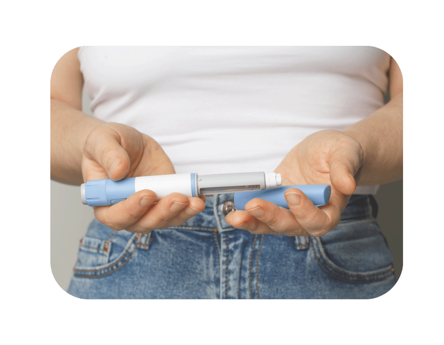 woman with ozempic breasts holding glp-1 weight loss injection pen