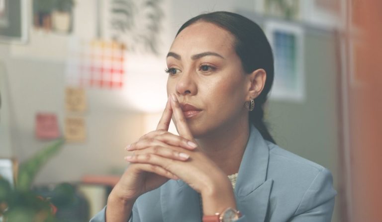 Woman reflecting after weight loss body changes