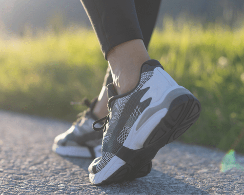 girl walking after breast reduction recovery