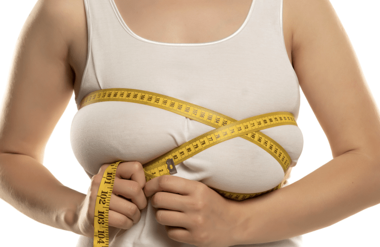 woman-measuring-large-breasts